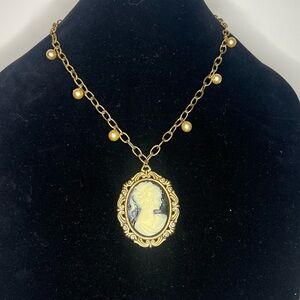 Elegant Gold and Black Cameo Pendant